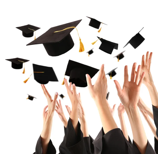 Students  throwing graduation hats — Stock Photo, Image