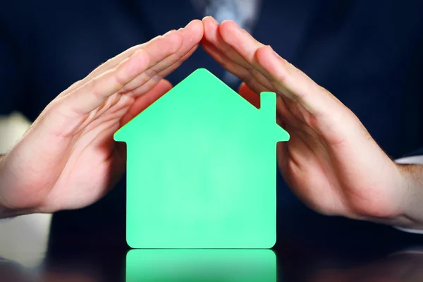 Male hands with model of house — Stock Photo, Image