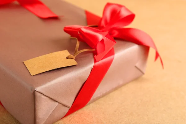 Beautiful gift with bow — Stock Photo, Image