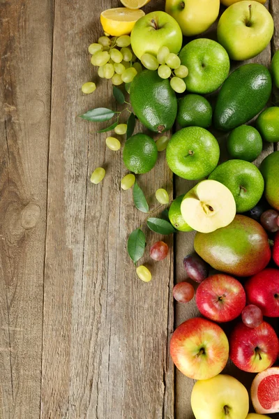 Fruits on wooden background — Stock Photo, Image