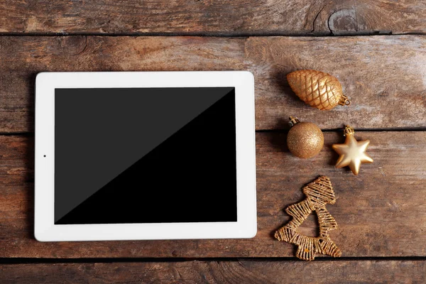 Tablet and Christmas decor — Stock Photo, Image