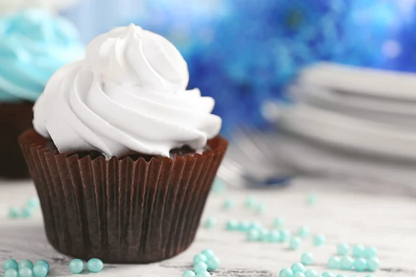 Cupcakes on wooden table — Stock Photo, Image