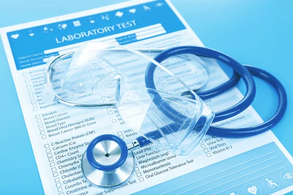 Laboratory test list, stethoscope and eyeglasses — Stock Photo, Image