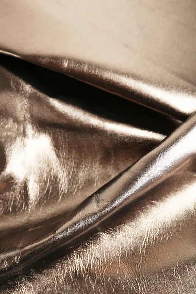 Dark brown shiny leather texture close up — Stock Photo, Image