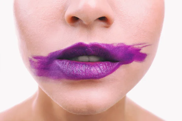 Woman's face with smeared  lipstick — Stock Photo, Image