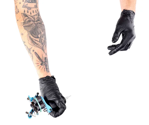 Tattooist hands in black gloves — Stock Photo, Image