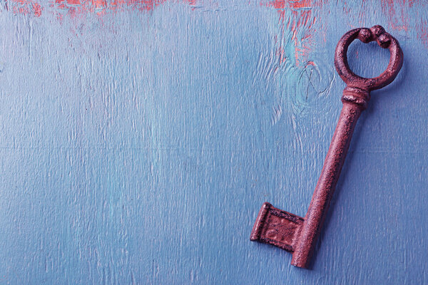 Old key on blue
