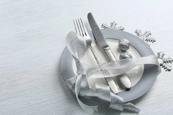 Christmas serving cutlery on plate — Stock Photo, Image