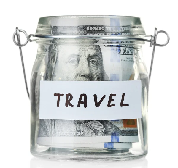 Glass jar with dollar banknotes for travel, isolated on white — Stock Photo, Image