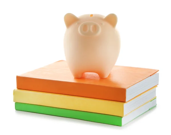 Piggy bank op de top van boeken — Stockfoto