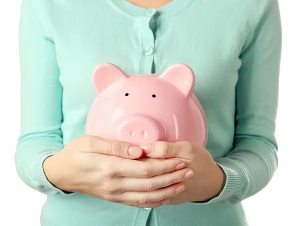 Mulher segurando banco porquinho na mão. Conceito de poupança financeira — Fotografia de Stock