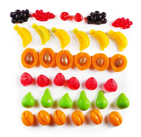 Set of lined colourful fruit jelly sweets, isolated on white — Stock Photo, Image