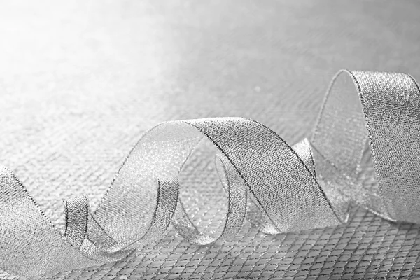 Silver curly ribbon — Stock Photo, Image