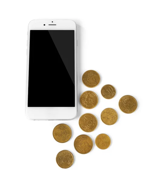 Smart phone with coins, isolated on white. Telephone charges — Stock Photo, Image