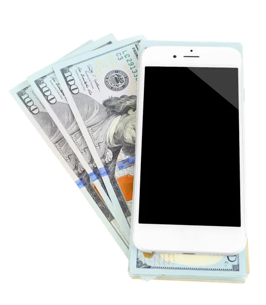 Teléfono inteligente en billetes de dólar, aislado en blanco. Concepto de ganancia de Internet —  Fotos de Stock