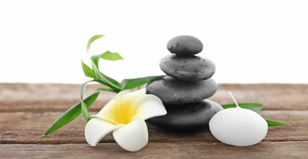 Spa stones with candle — Stock Photo, Image