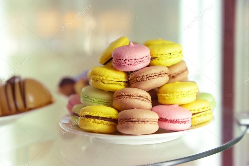 Set of colorful macaroons in plate close up