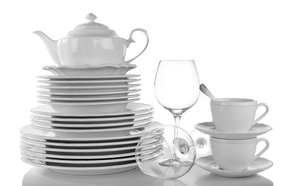 Woman wiping the dishes on white background — Stock Photo, Image