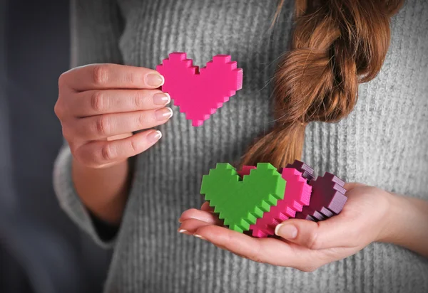 Plástico rompecabezas corazones — Foto de Stock