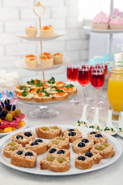 Set of cold snacks, canape, beverages and dessert, closeup — Stock Photo, Image