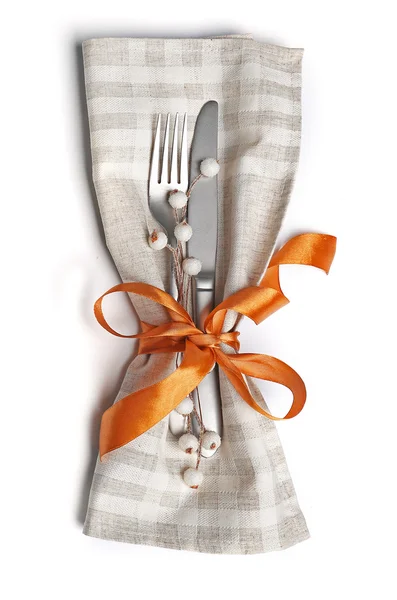 Christmas serving cutlery in a napkin, isolated on white — Stock Photo, Image