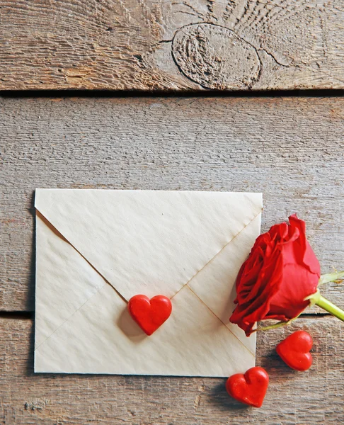 Beautiful rose with gift card — Stock Photo, Image