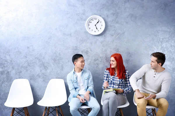 people sitting on chairs