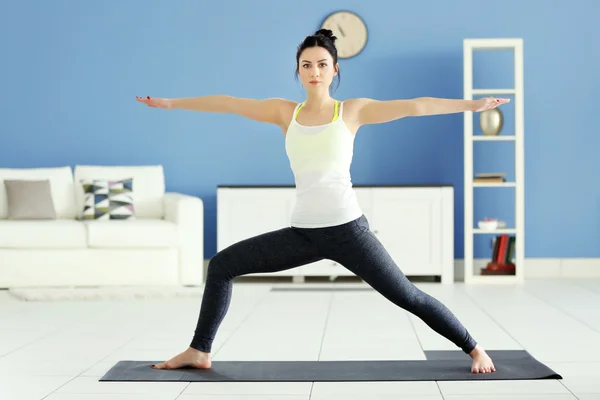 Woman does yoga exercise — Stock Photo, Image