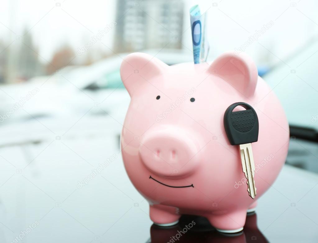 Piggy money box with cash and key 