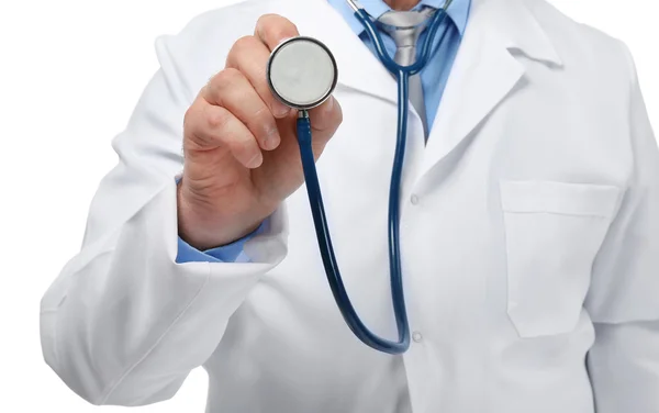 Doctor with stethoscope at workplace — Stock Photo, Image