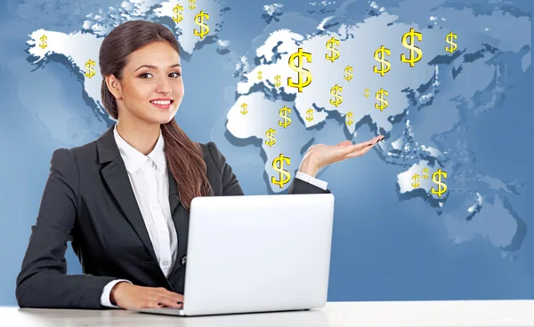 Business lady with laptop on world map