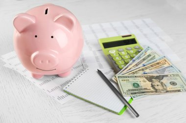 Kumbara, hesap makinesi, dolar