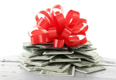 Fiyonklu hediye olarak dolar yığını 