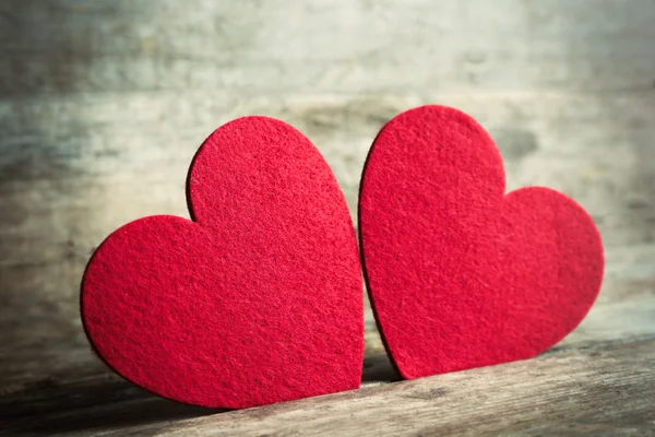 Red felt hearts — Stock Photo, Image