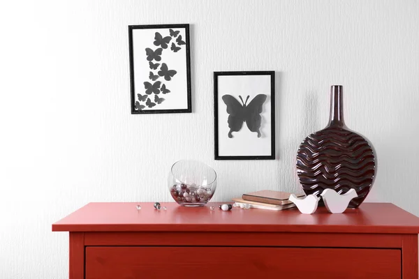 Room interior with red wooden commode — Stock Photo, Image