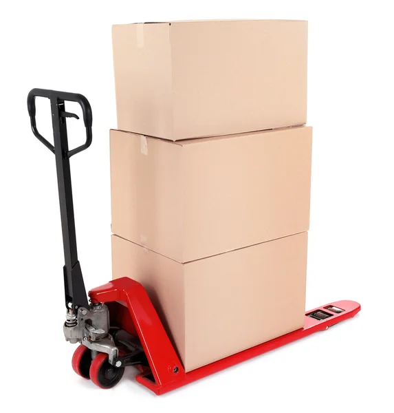 Fork pallet truck with stack of cardboard boxes — Stock Photo, Image