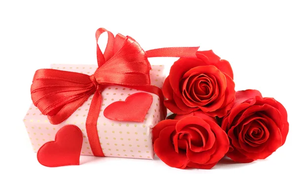 Gift box, rose flowers and heart Stock Photo