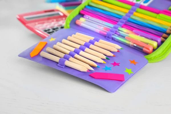 Pencil case with various stationery — Stock Photo, Image