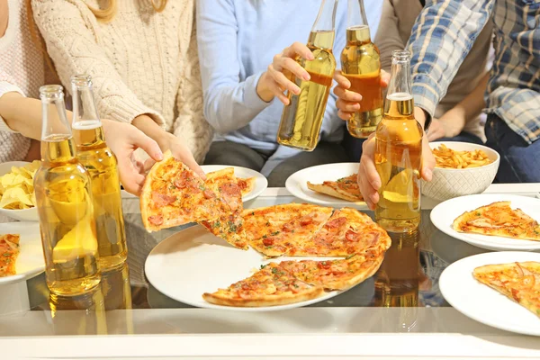 Friendly party with hot pizza — Stock Photo, Image