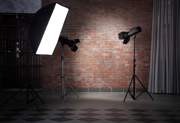 Photo studio with lighting equipment — Stock Photo, Image