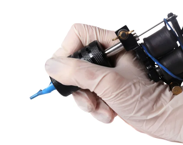 Tattoo machine in de hand — Stockfoto