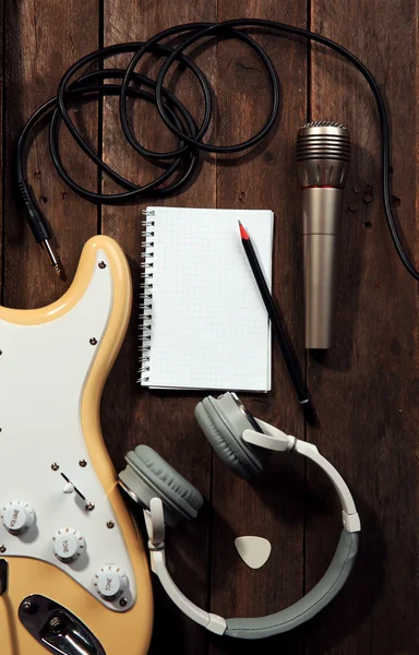 Electric guitar with headphones — Stock Photo, Image