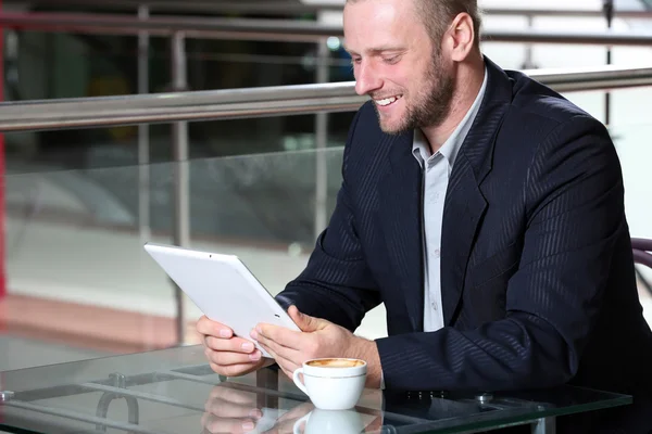 Young attractive businessman having lunch — Stock Photo, Image