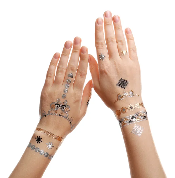 Tatuaje flash en manos femeninas — Foto de Stock