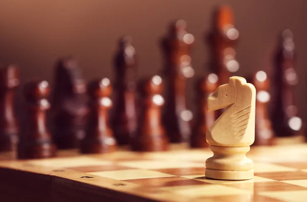 Chess pieces and game board — Stock Photo, Image