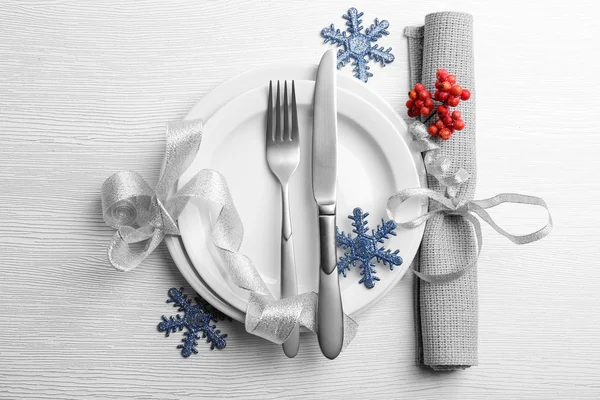 Christmas serving cutlery on plate — Stock Photo, Image