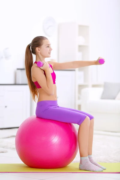 Young girl making fitness exercise — Stock Photo, Image