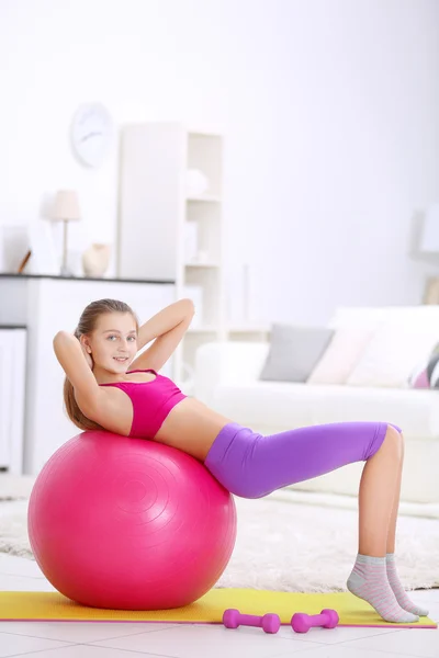 Young girl making fitness exercise — Stock Photo, Image