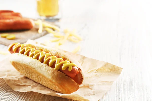 Hot dog with fried potatoes — Stock Photo, Image