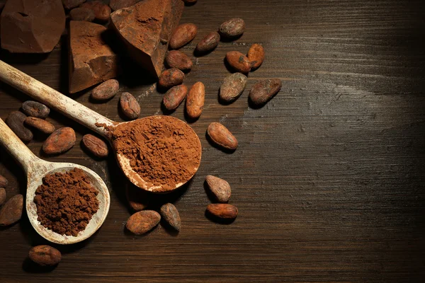 Spoon with aromatic cocoa and chocolate — Stock Photo, Image